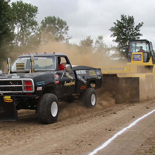 Truck pulling sled at tractor pull